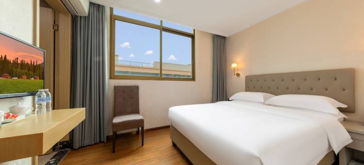 TOWO上品酒店(深圳石岩东海百货店)图片