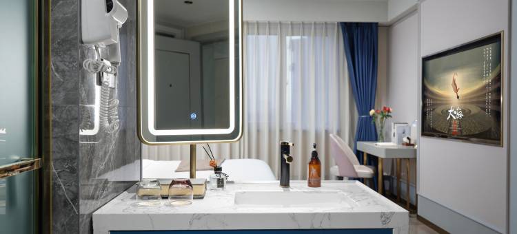 成都城上轻居酒店(新都锦水河地铁站店)图片