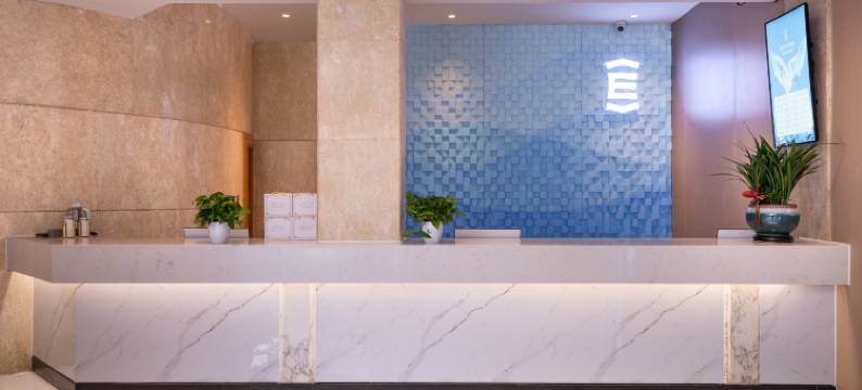 艺龙海雅酒店(许昌胖东来时代广场曹魏古城店)图片