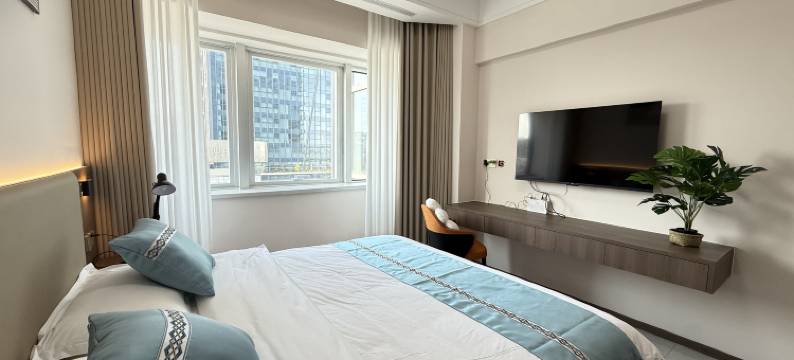 沃曼融悦民宿(东营金融港店)图片