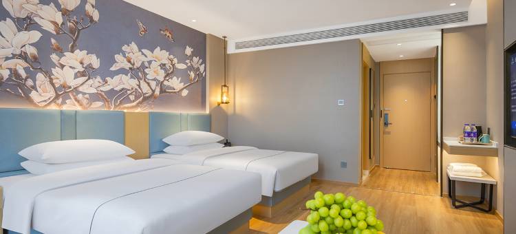 白玉兰酒店(平南中心广场店)图片