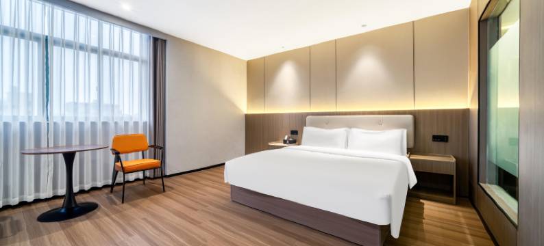 回禾新中心酒店(台州路桥十里长街中盛广场店)图片