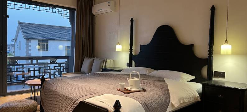 M·漫画蜗牛·山禾悦·宋式禅意风设计师美墅民宿(太湖东山景区店)图片