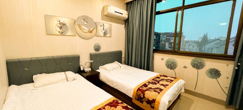 苏州玫瑰园商务宾馆(铜罗古镇店)图片