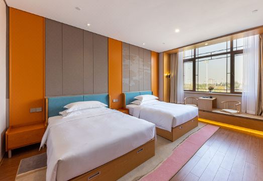 Maison New Century Hotel Overview