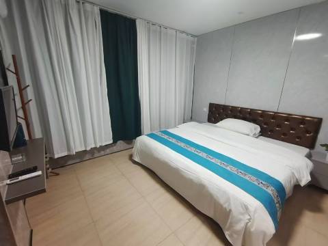 怡人宾馆(春申路店)