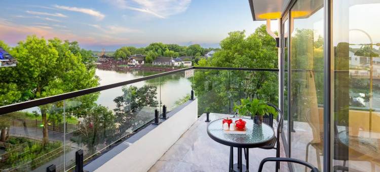 周庄慢生活湖景设计民宿图片