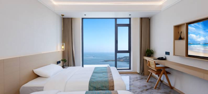 荣成凤栖海岸假日酒店(西霞口动物园店)图片