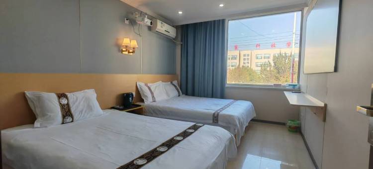 吉林爱家时尚宾馆(九站农校科技学院店)图片