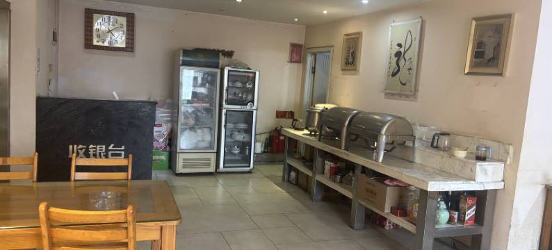 懒虫酒店(许昌曹魏古城胖东来生活广场店)图片