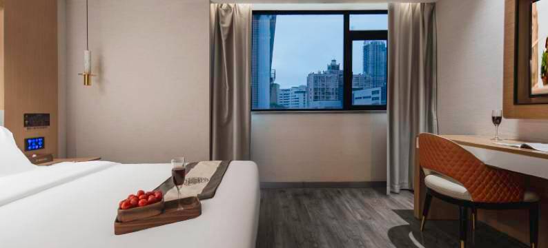 咖曼酒店(万象城六沟垅地铁站店)图片