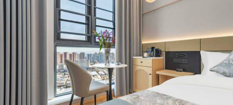 昆明格林曼酒店(广福路巫家坝地铁站店)图片