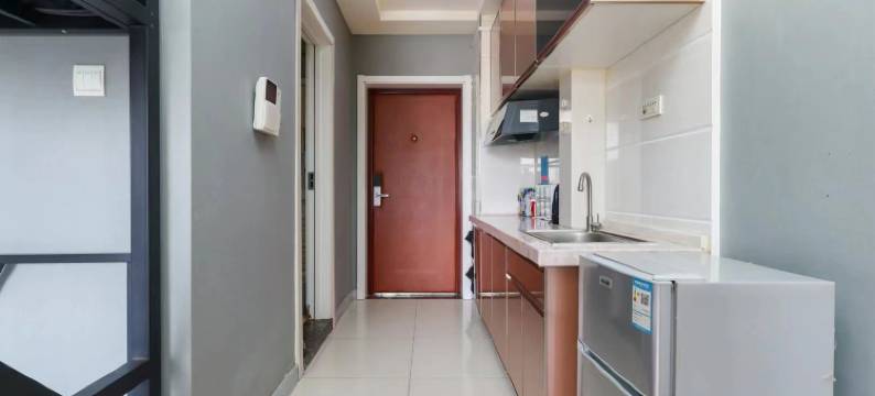 长春桃花缘自助式公寓图片