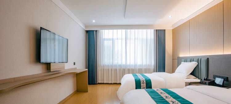 临河大酒店(巴彦淖尔高铁站维多利摩尔城店)图片