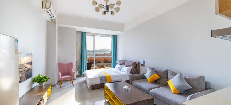 青岛木奕海景公寓(黄岛金沙滩城市传媒店)图片