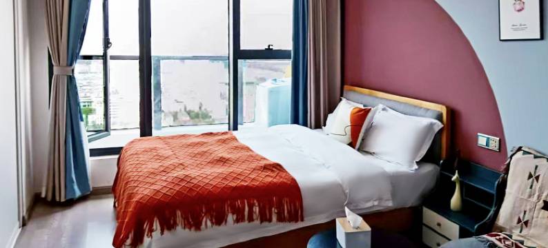 以礼娜姑民宿(云南财经大学龙泉校区万彩城店)图片