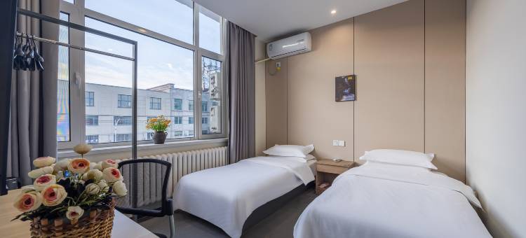 速8酒店(大连营城子商场店)图片