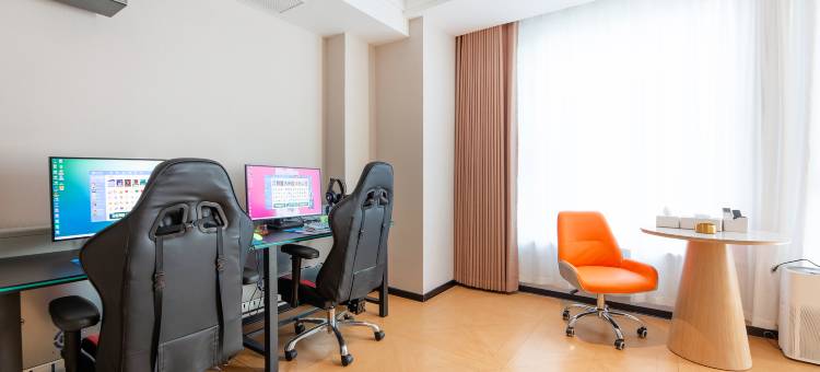 法布戈电竞电影酒店(西美花街红旗大街店)图片