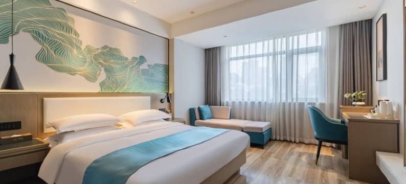 苹果淳源酒店(元一名城火车站店)图片