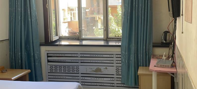 佳木斯中华旅店(大商新玛特佳木斯市中心医院店)图片