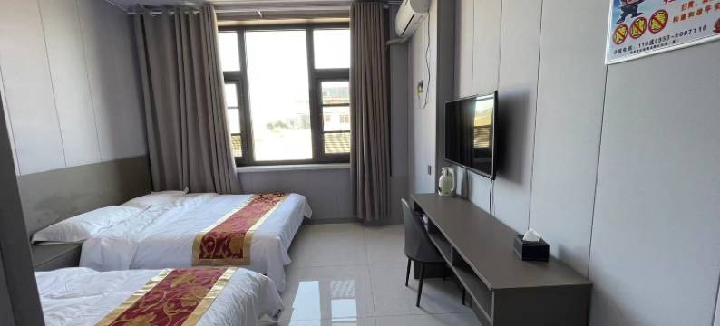 怡然自得宾馆图片