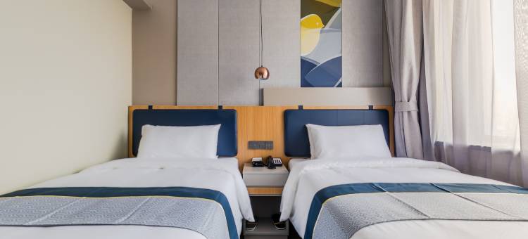 艺龙万国酒店(锦州火车站上海路店)图片