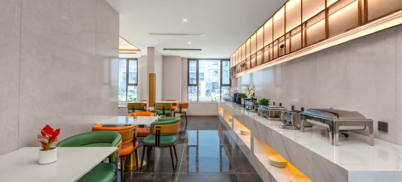 白玉兰商务酒店(青岛东方伊甸园金茂览秀城店)图片