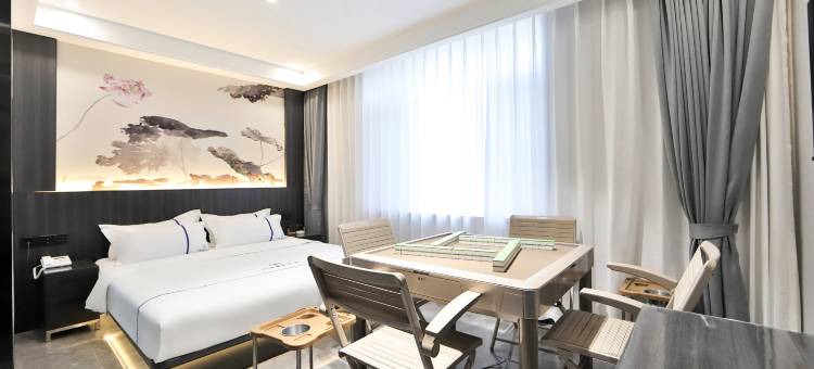 白城回家商务宾馆(火车站新华东大路店)图片