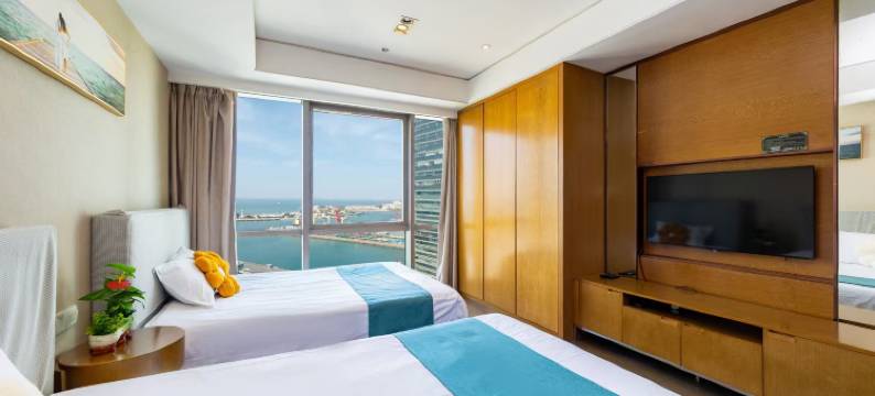 青岛亚新海景度假公寓(中联自由港湾火车站店)图片