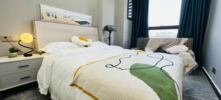 优伽城市投影公寓(鹿城店)图片