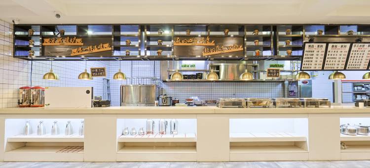 梓里酒店(哈尔滨江北大学城地铁站店)图片