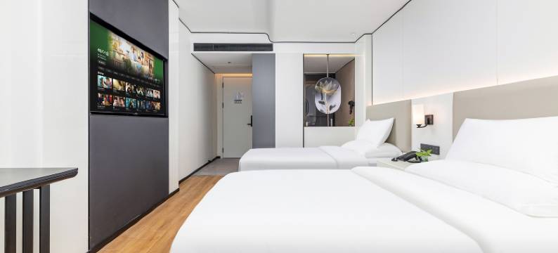 新密喜鹊精品酒店(中强光年城市广场店)图片