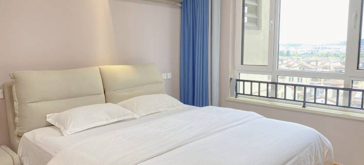 烟台玖居公寓(养马岛龙湖葡醍商业街店)图片