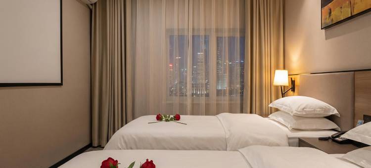 爱蒂儿智能酒店(盘锦火车站兴隆大厦第二百货店)图片