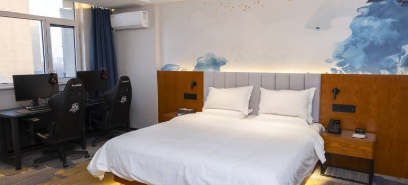 一芯一动电竞民宿(德州平原德百广场店)图片