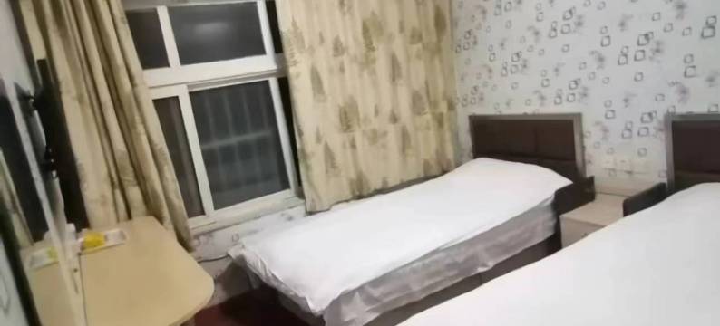 青岛城市客房宾馆图片