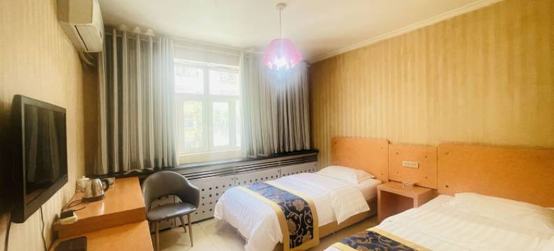 新粮宾馆(乌鲁木齐国际机场店)图片