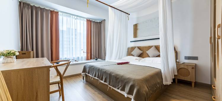 栖牛投影自助民宿(乐山高铁站店)图片