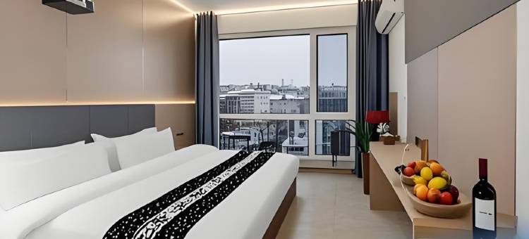 曼朵轻奢智能影音酒店(威海火炬八街国际海水浴场店)图片