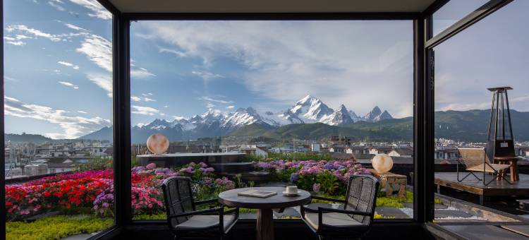 既见山野丨日照金山空中花园雪山观景隐奢度假酒店(丽江古城店)图片