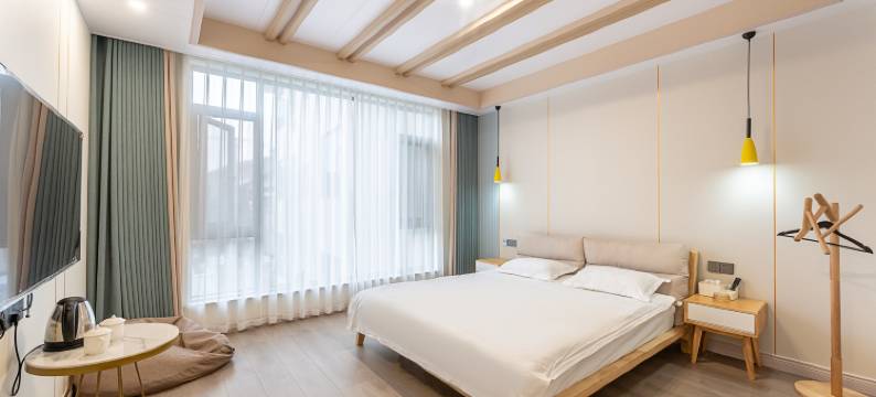 六十六号民宿(OMG心跳乐园店)图片