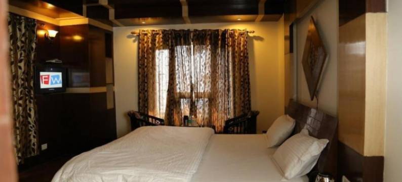 慕苏里格鲁姆戈购物中心路阿比南丹酒店(Goroomgo Abhinandan Mall Road Mussoorie)图片