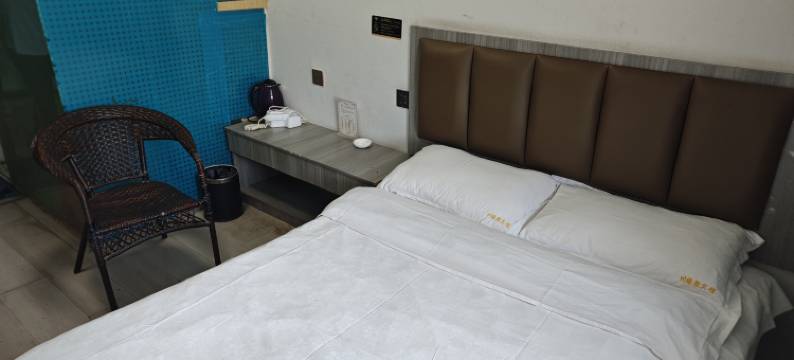 麦盖提川缘聚宾馆(卡龙情中央广场店)图片