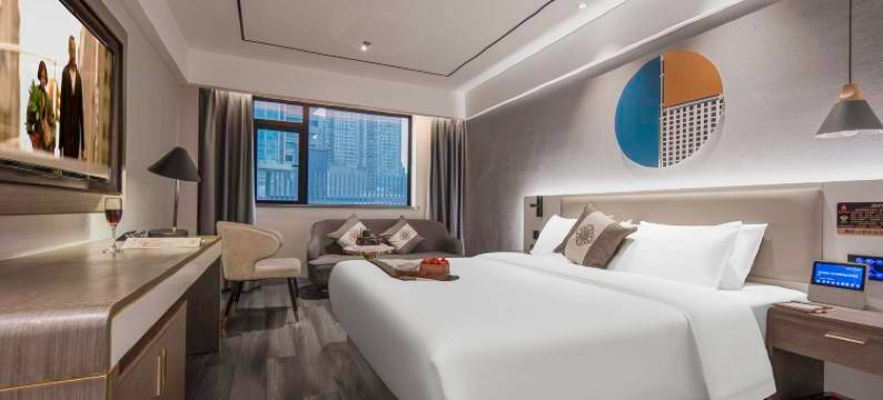 咖曼酒店(万象城六沟垅地铁站店)图片