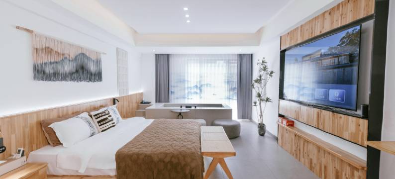 一宿酒店(乐山高铁站世豪广场店)图片