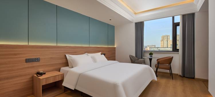 艺龙万国酒店(驻马店平舆县解放街店)图片