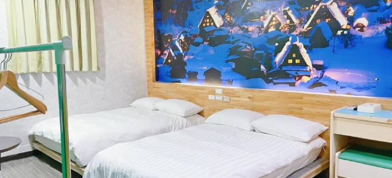 幸运草轻巧旅店图片