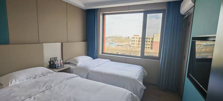 星橙酒店(巴彦淖尔维多利摩尔城店)图片