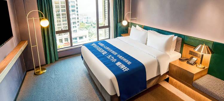 天龙湾曼悦酒店(百色站万景城夜市店)图片