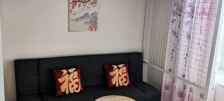 暖嘉旅舍(大季家高铁站蓬莱机场店)图片